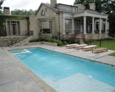 Geometric lap pool with deck jets